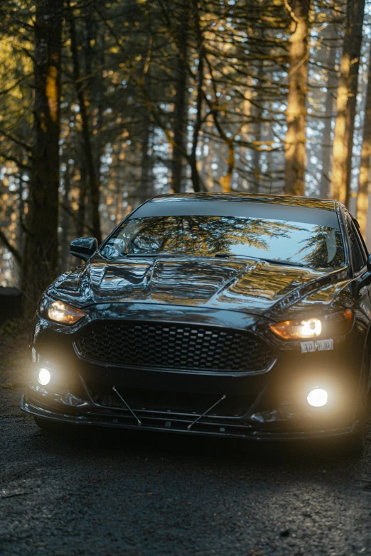 a car driving on the road with its headlights off