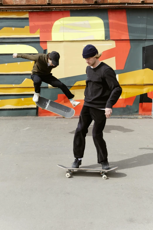 a couple of guys that are on some skateboards