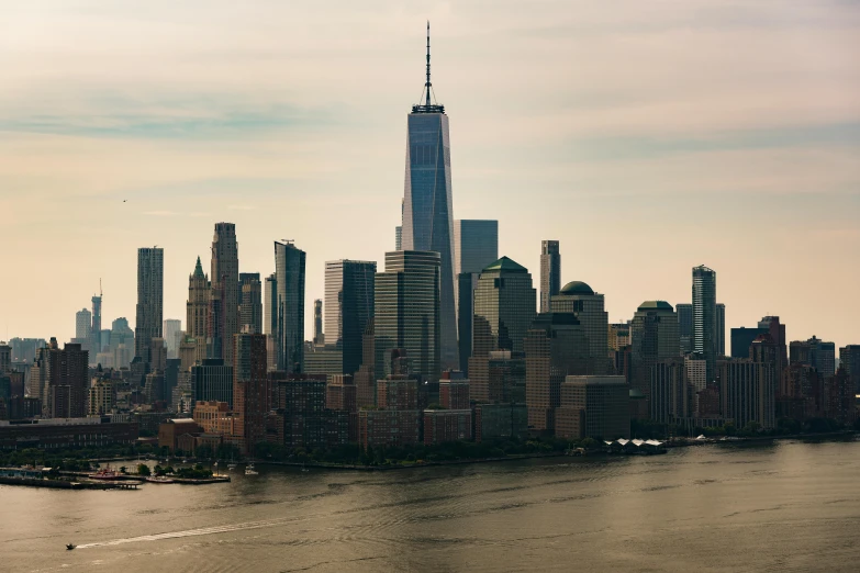 this is an aerial view of a city and a large body of water