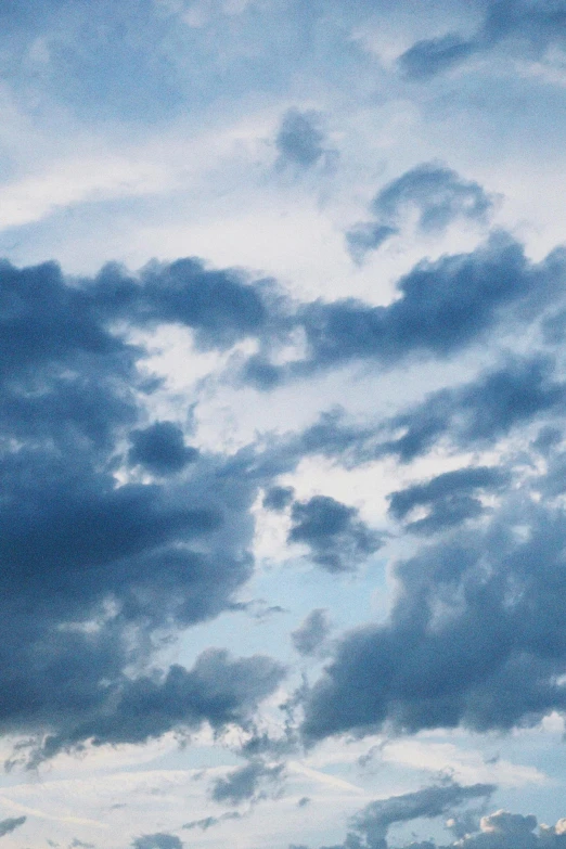 a blue and white sky filled with lots of clouds