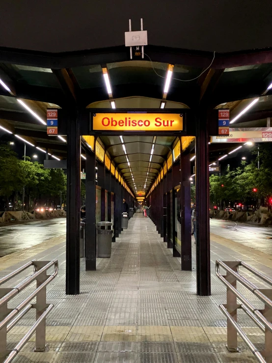 an empty metro station at night with no passengers