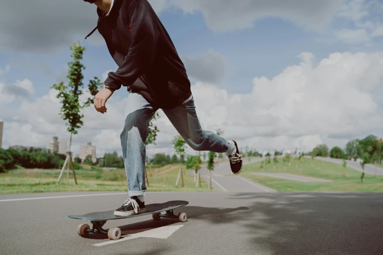 a man in the process of doing tricks on a skateboard