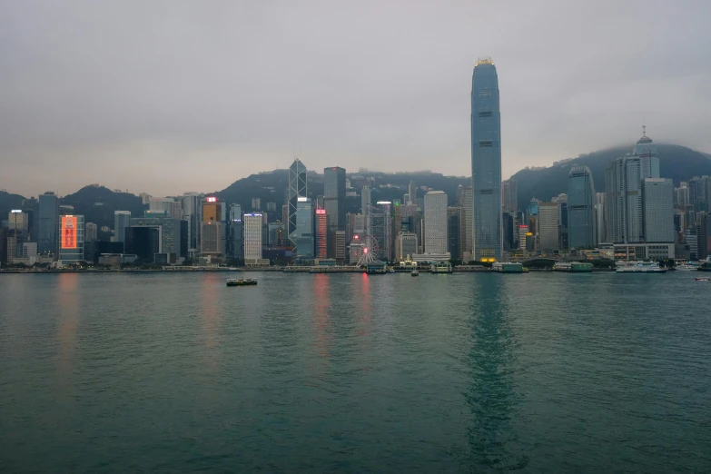 the city skyline in hong kong from across the water