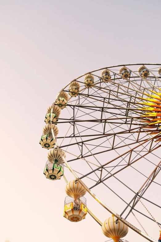 the large ferris wheel has lights on all sides