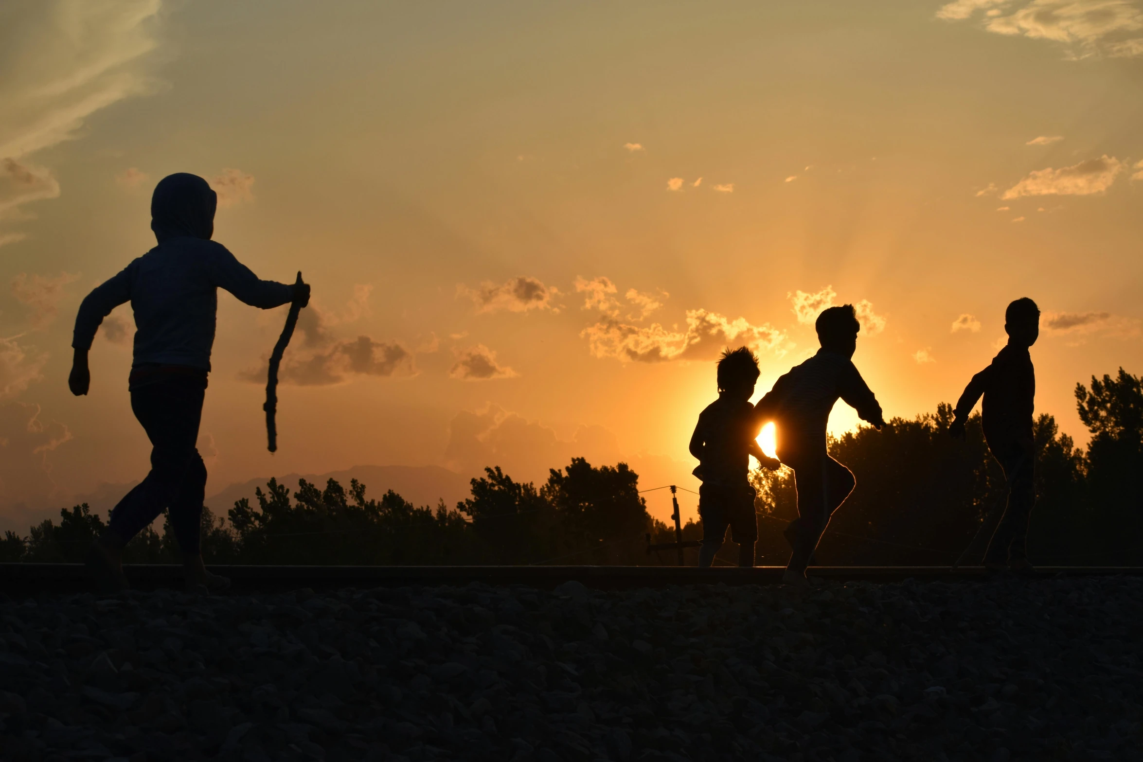 a group of people on top of a hill