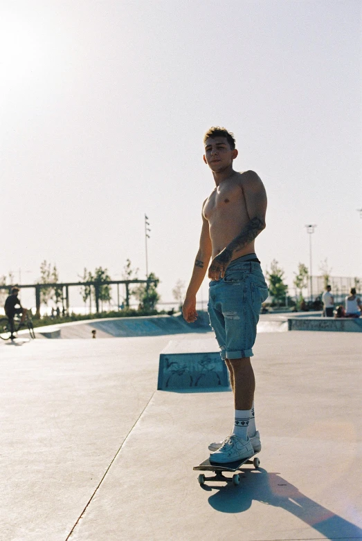 a man riding a skateboard down the middle of a ramp