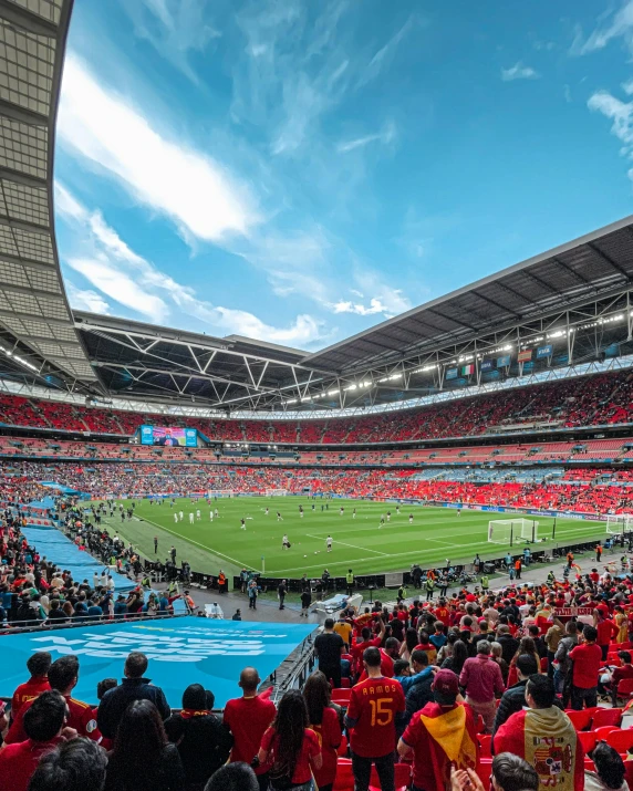 large stadium full of people as seen from the first row