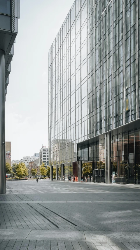 a row of buildings next to a sidewalk