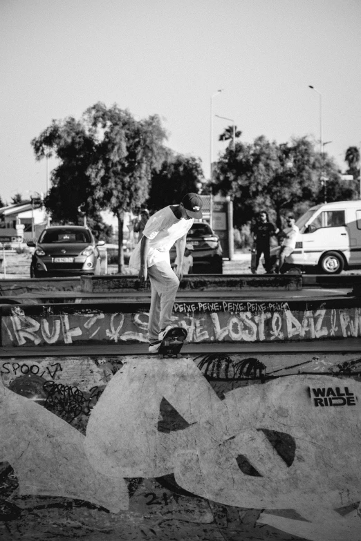 a black and white po of a skateboarder