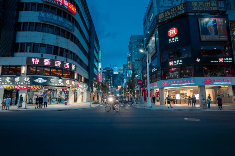 people are walking on a street in a large city