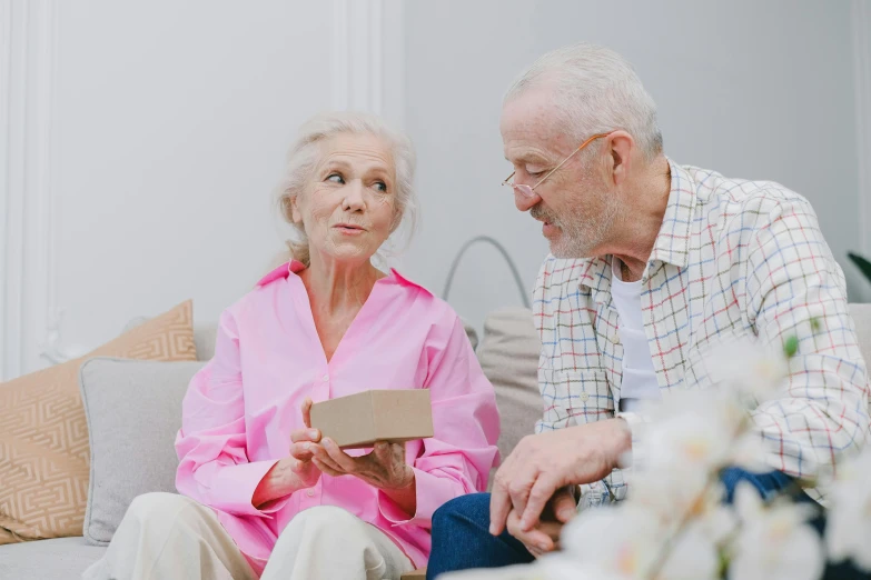 an elderly couple in love looking at each other