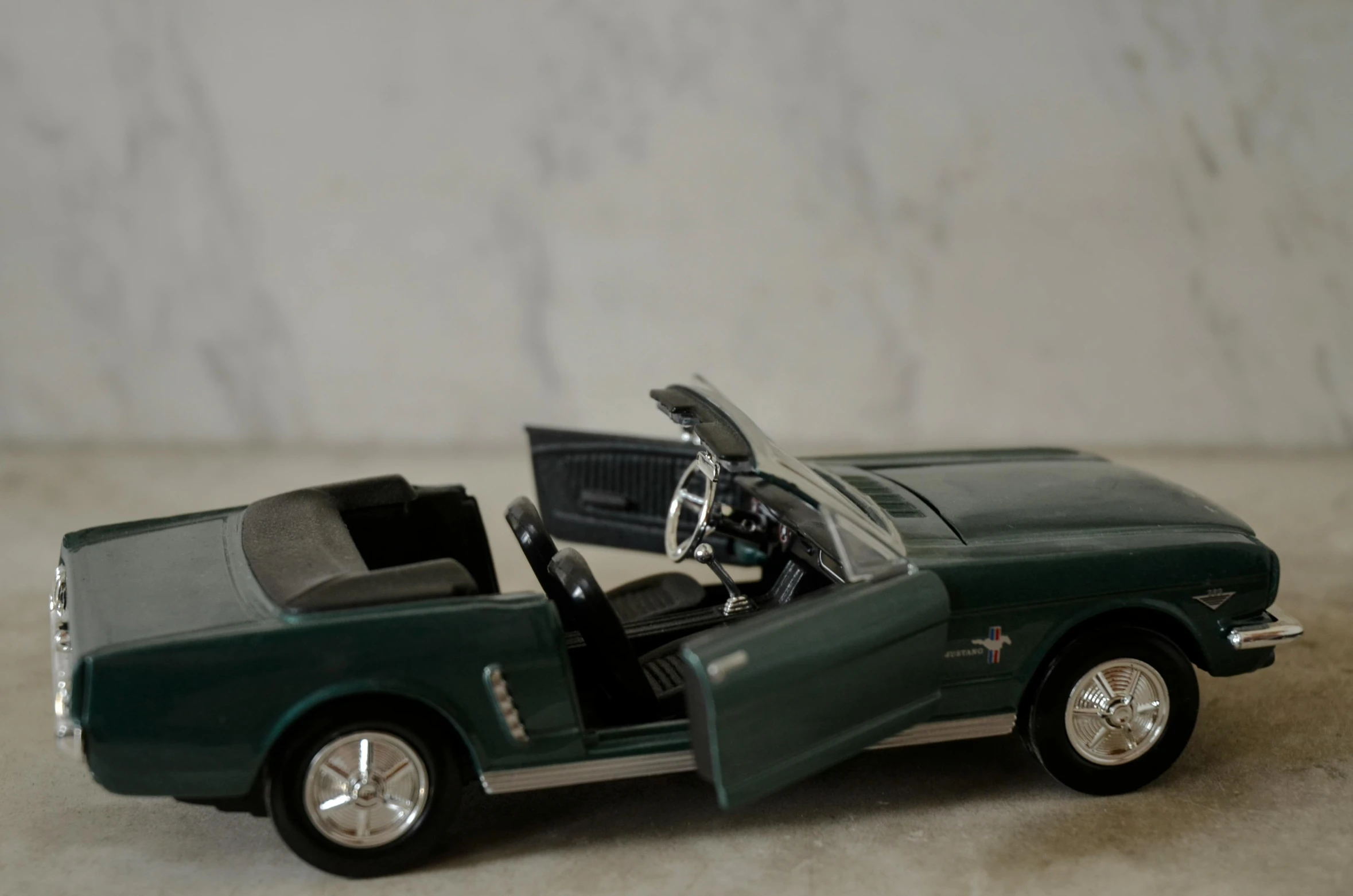 the toy car is equipped with two seats and a flat front