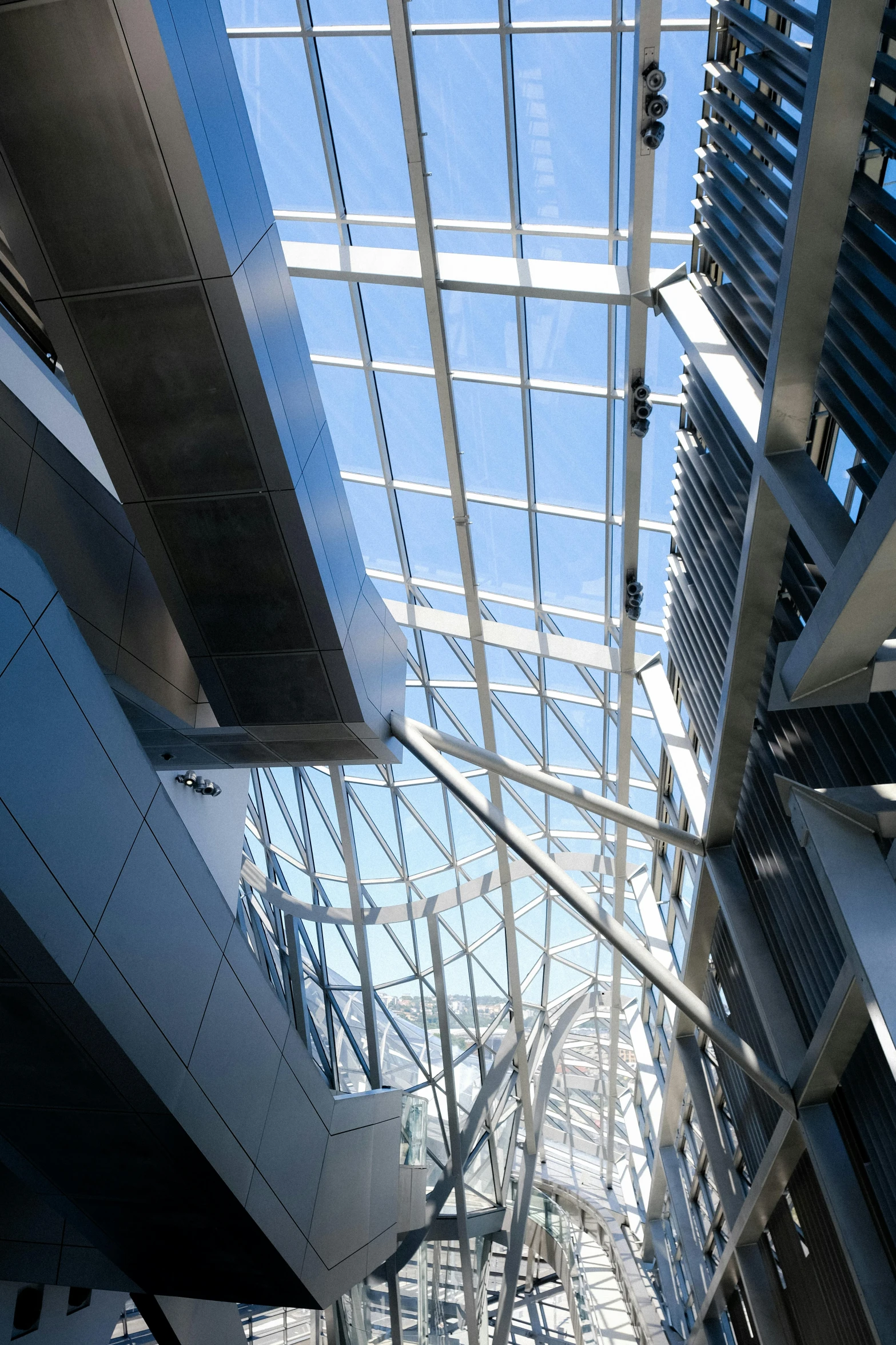 looking up at the ceiling of a building