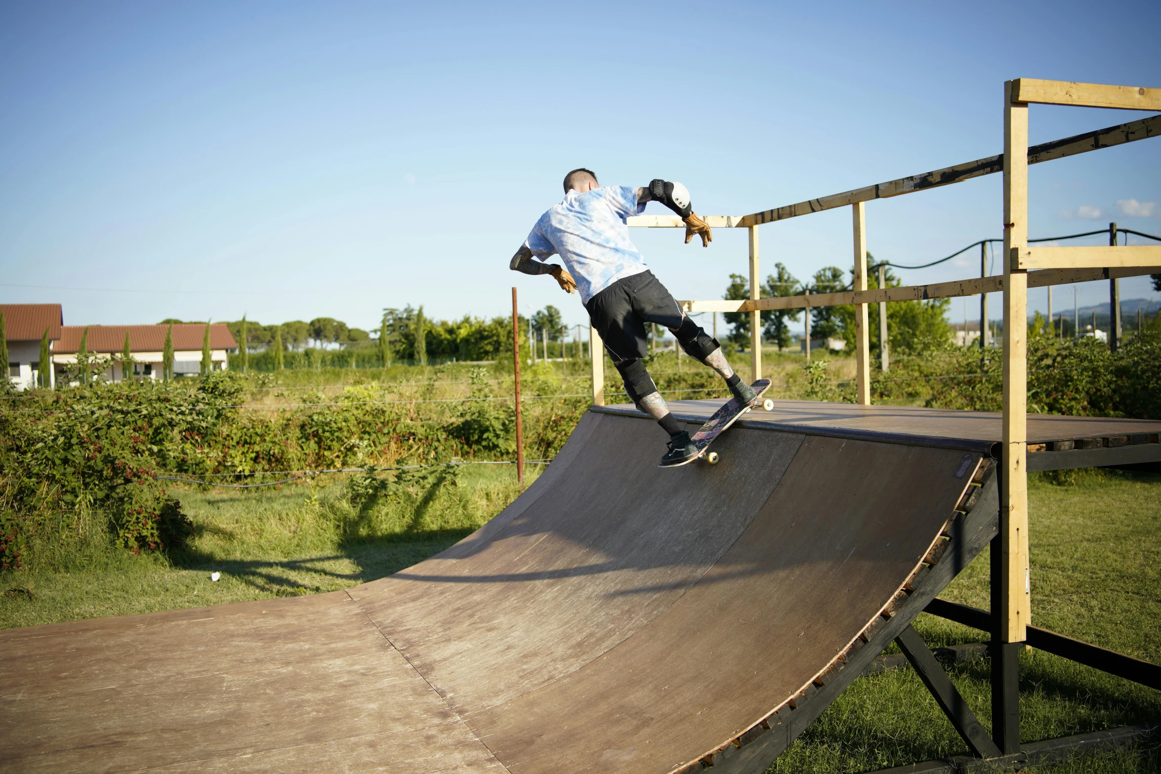 a skateboarder riding a ramp on top of a ramp