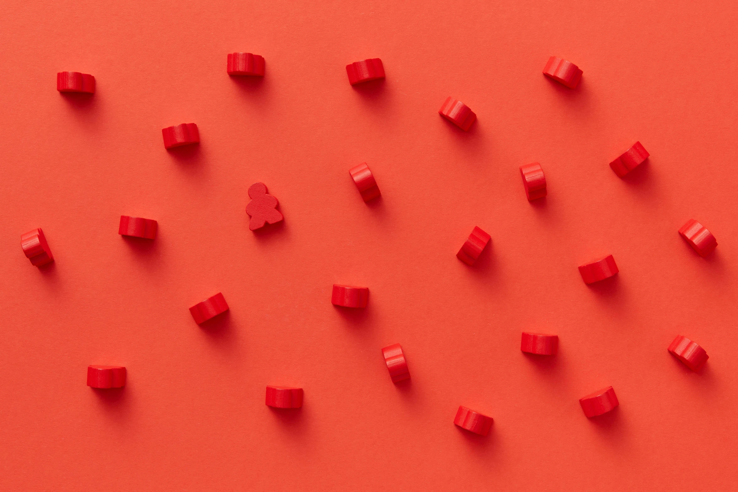 an array of small cubes with one red piece standing out