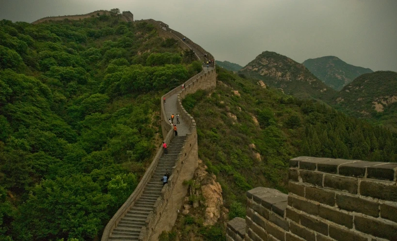 a very long and narrow road on the side of a mountain