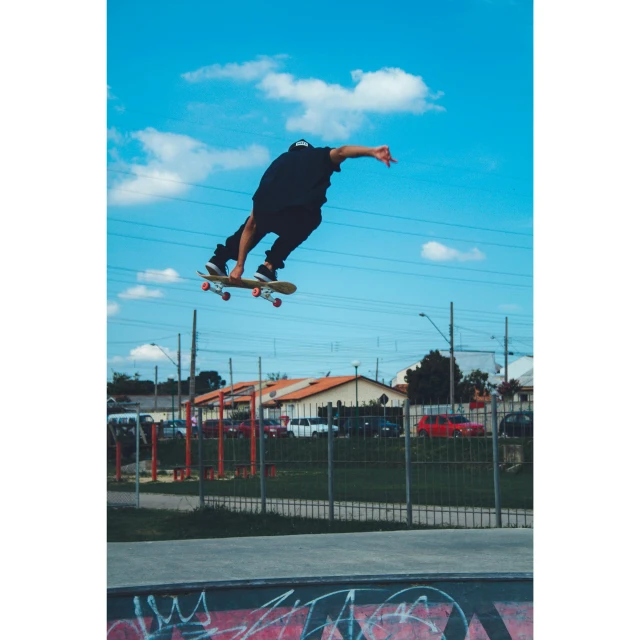 a man is jumping high while on his skateboard