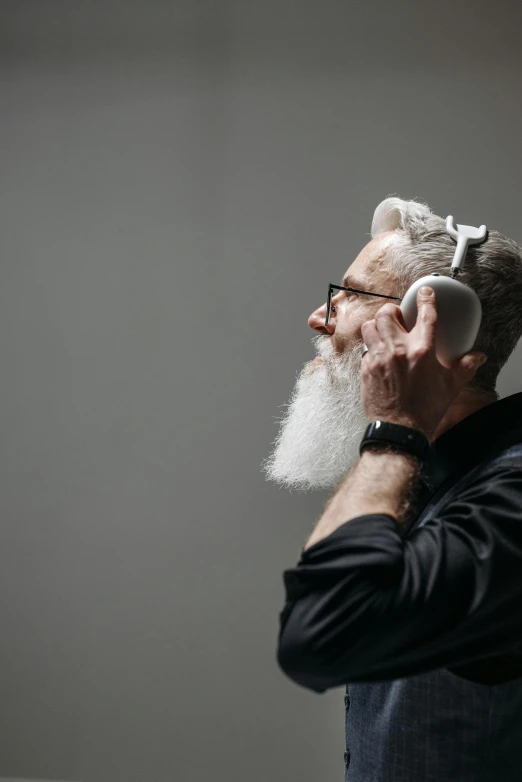 an older man talking on his cell phone