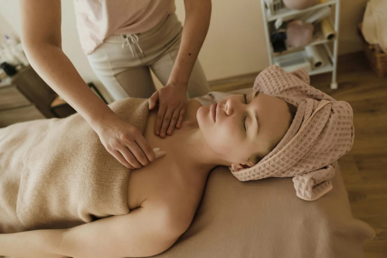 a person getting a facial massage at a el