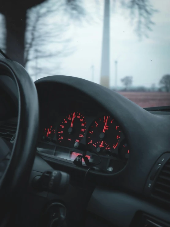 a dashboard with a digital display showing the time and direction