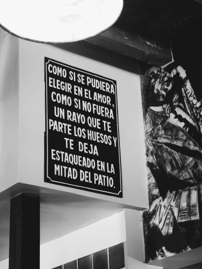 this is a black and white image of a spanish sign