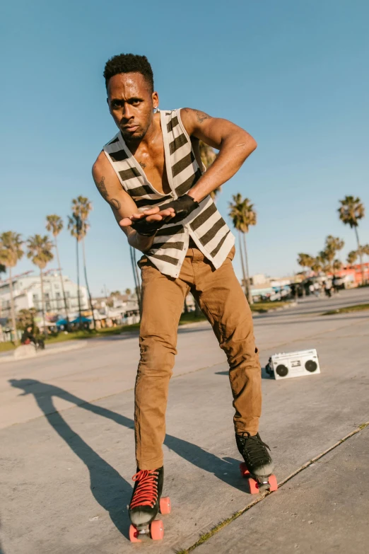 a man riding a skateboard on top of cement