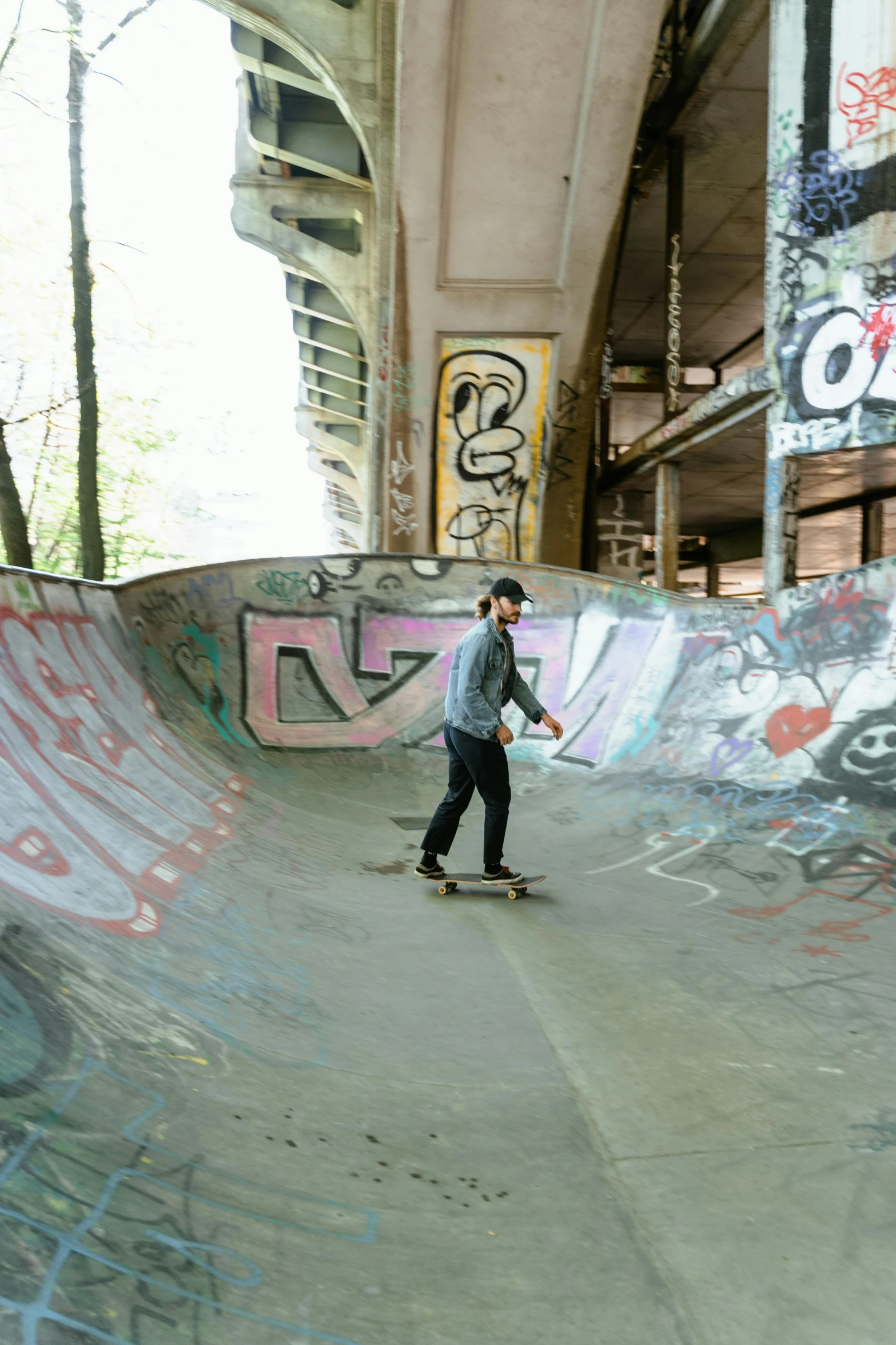 a young man is skating on a ramp