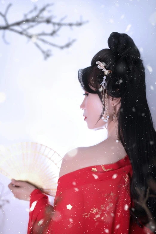 a woman is wearing an elaborate head piece with long hair