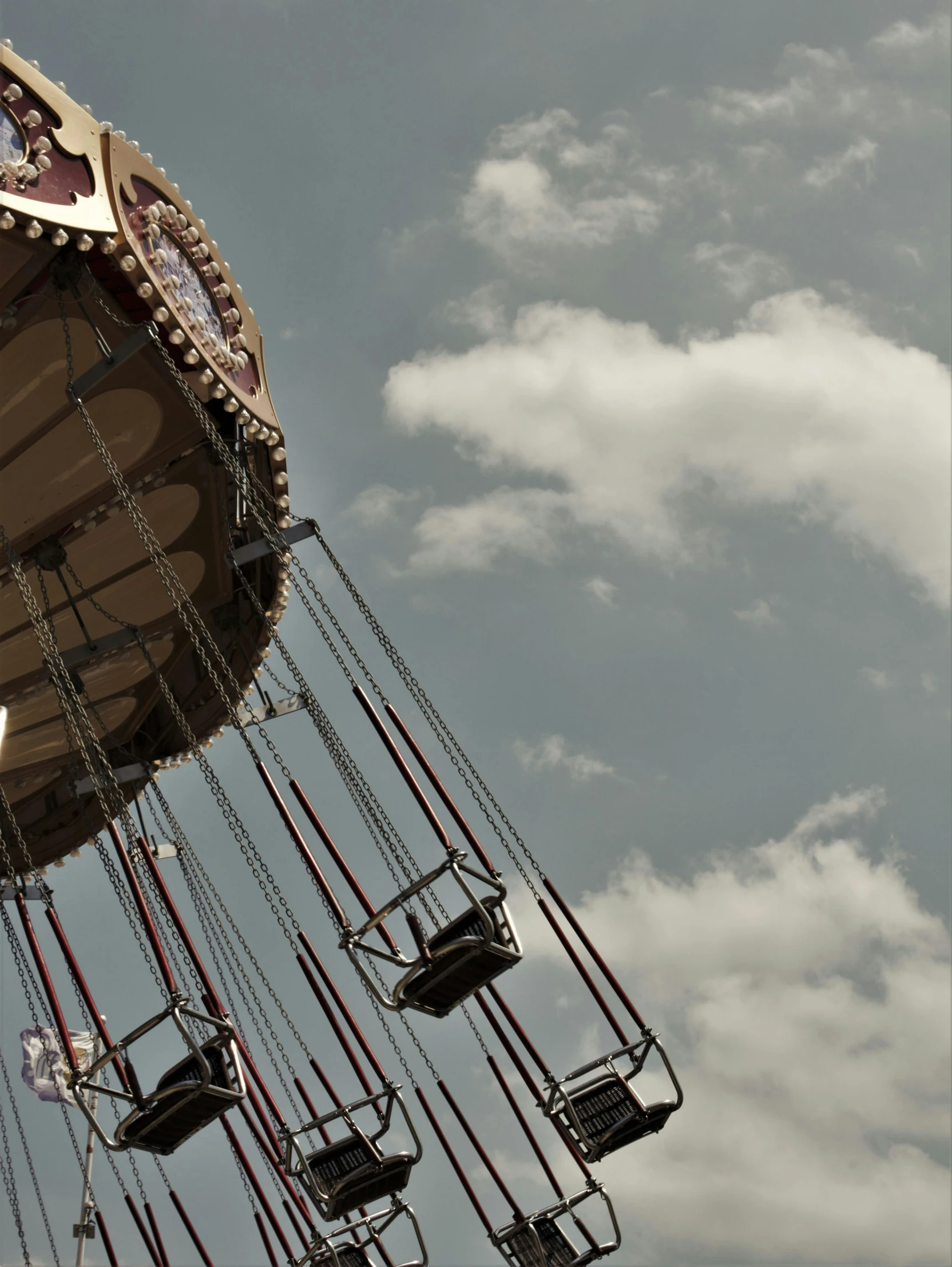 an image of some very pretty swings in the sky