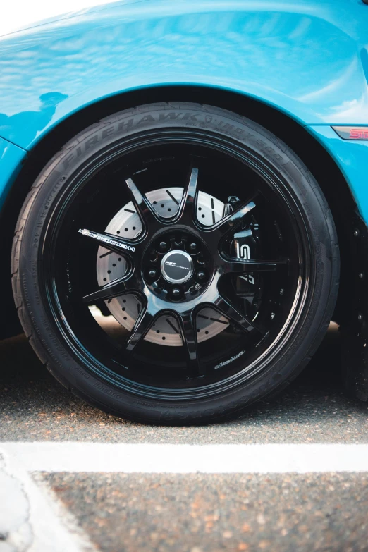 the spokes and tires of a racing car