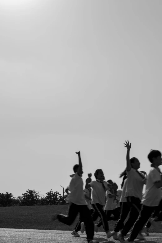 black and white po of a group of people on the street