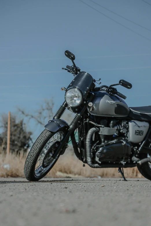 a motorcycle is sitting in the middle of a road