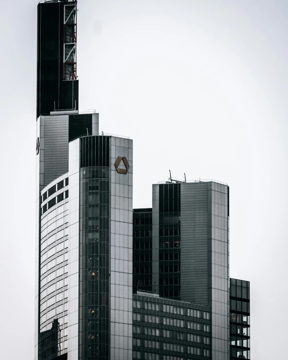 the black and white po shows a building and clock tower