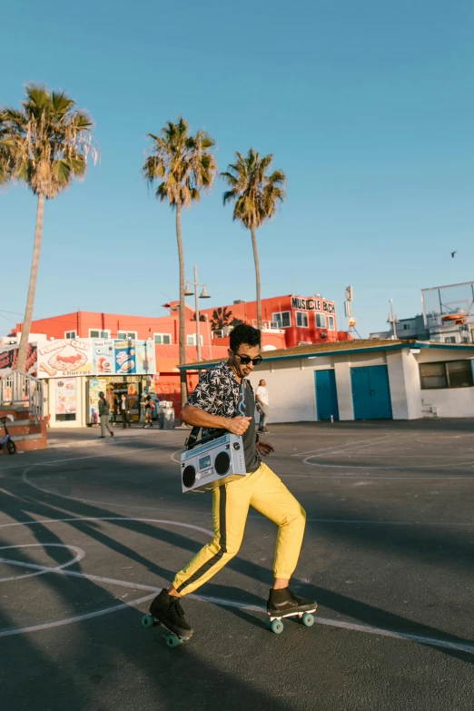 a person riding on a skate board in the middle of a parking lot