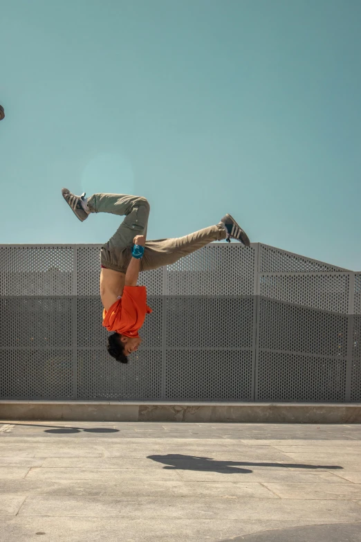 a man who is doing a trick on a skateboard