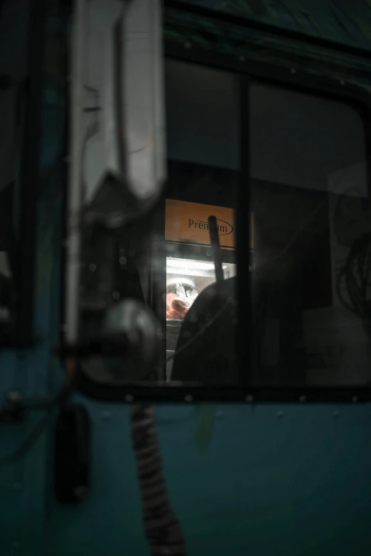 a person is shown from behind a bus