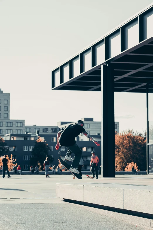 a person jumping in the air with a skateboard