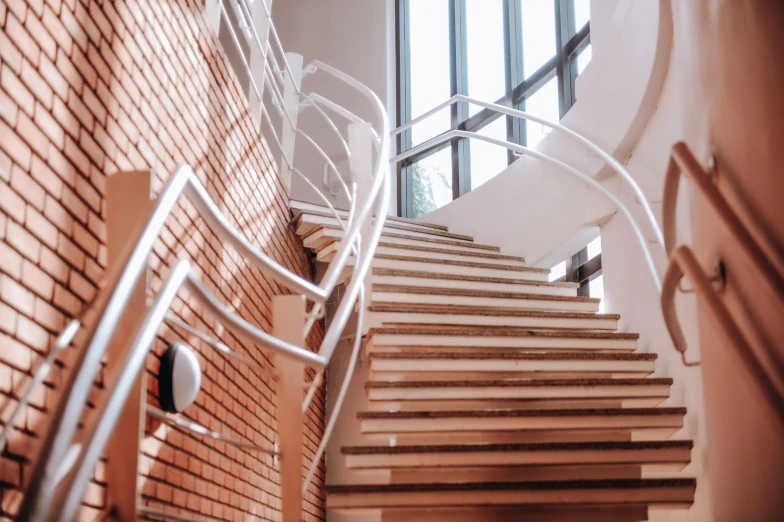 a spiral staircase made out of wood planks