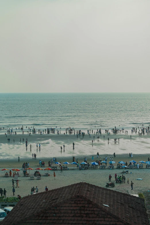 an image of some people at the beach