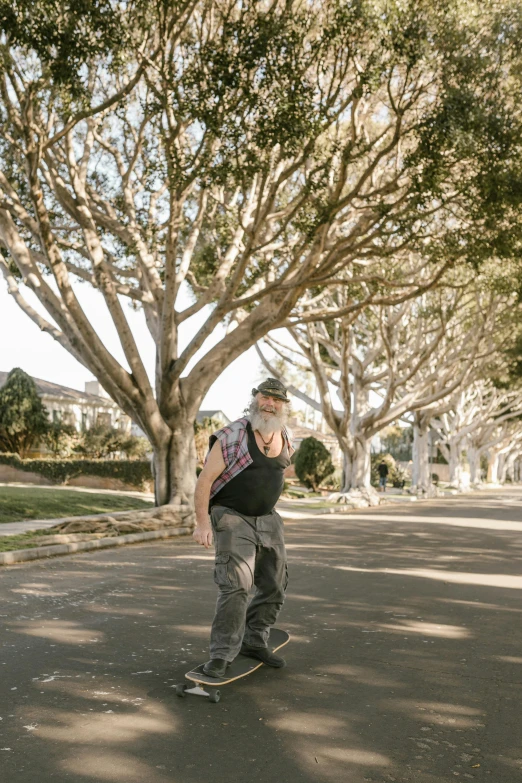 man in a plaid shirt on a skateboard