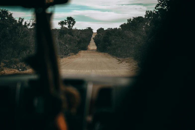 the view from inside of a car looking out of the driver's window