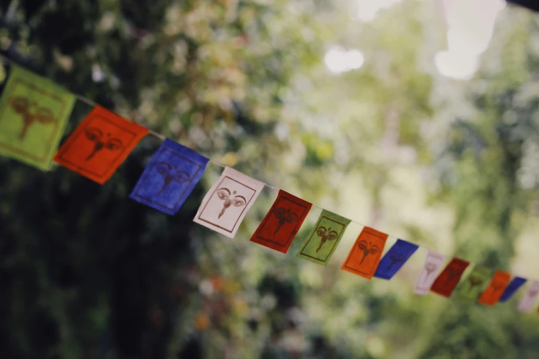 a string with several different colored cards on it