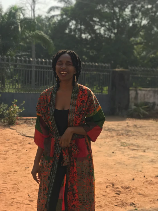 a woman with an ethnic dress and scarf