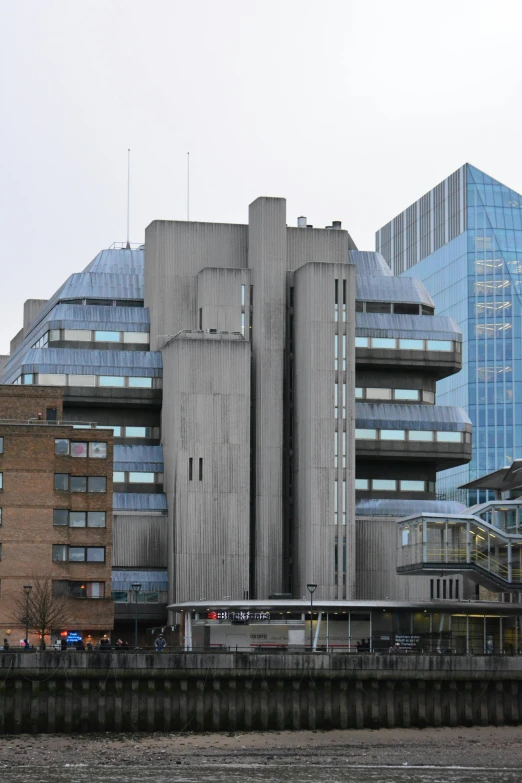 a view of some buildings near the ocean