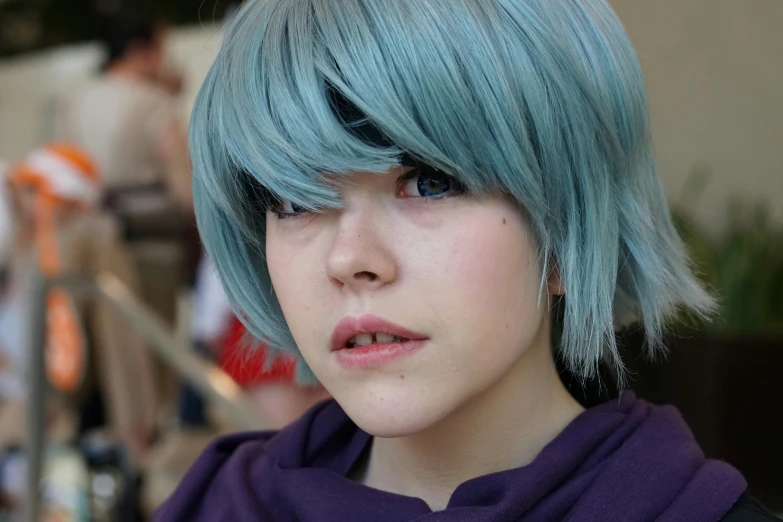 an image of a woman with blue hair
