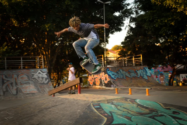 a man flying through the air while riding a skateboard