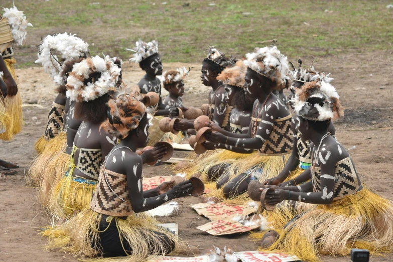 the men are dressed up as indigenous indians