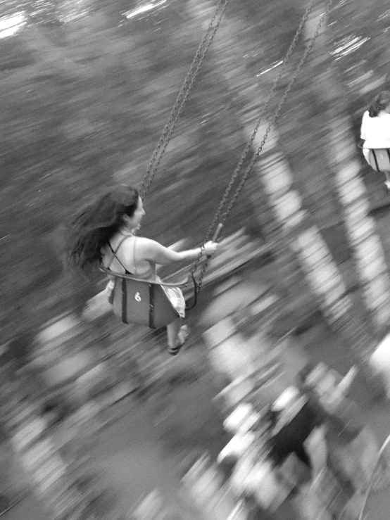 a  swinging a rope set by hand in a park