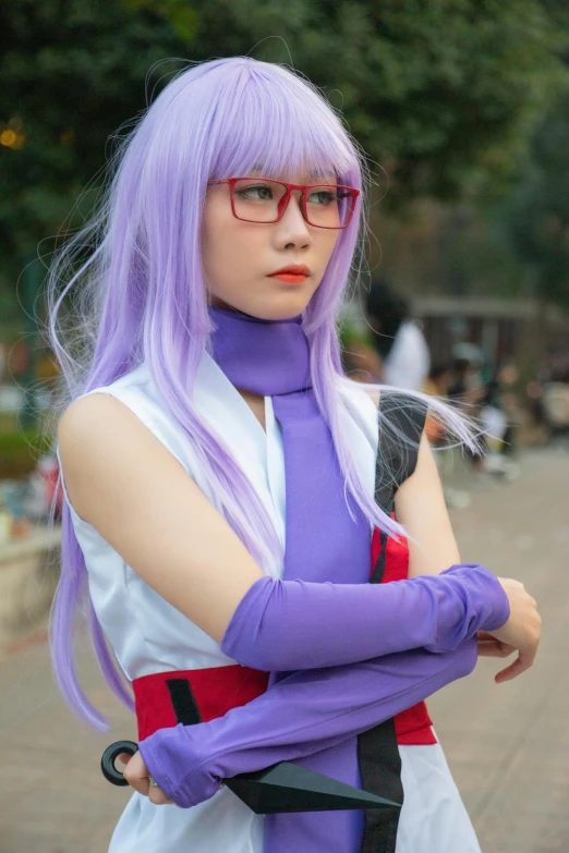 a person with glasses, gloves, and purple hair
