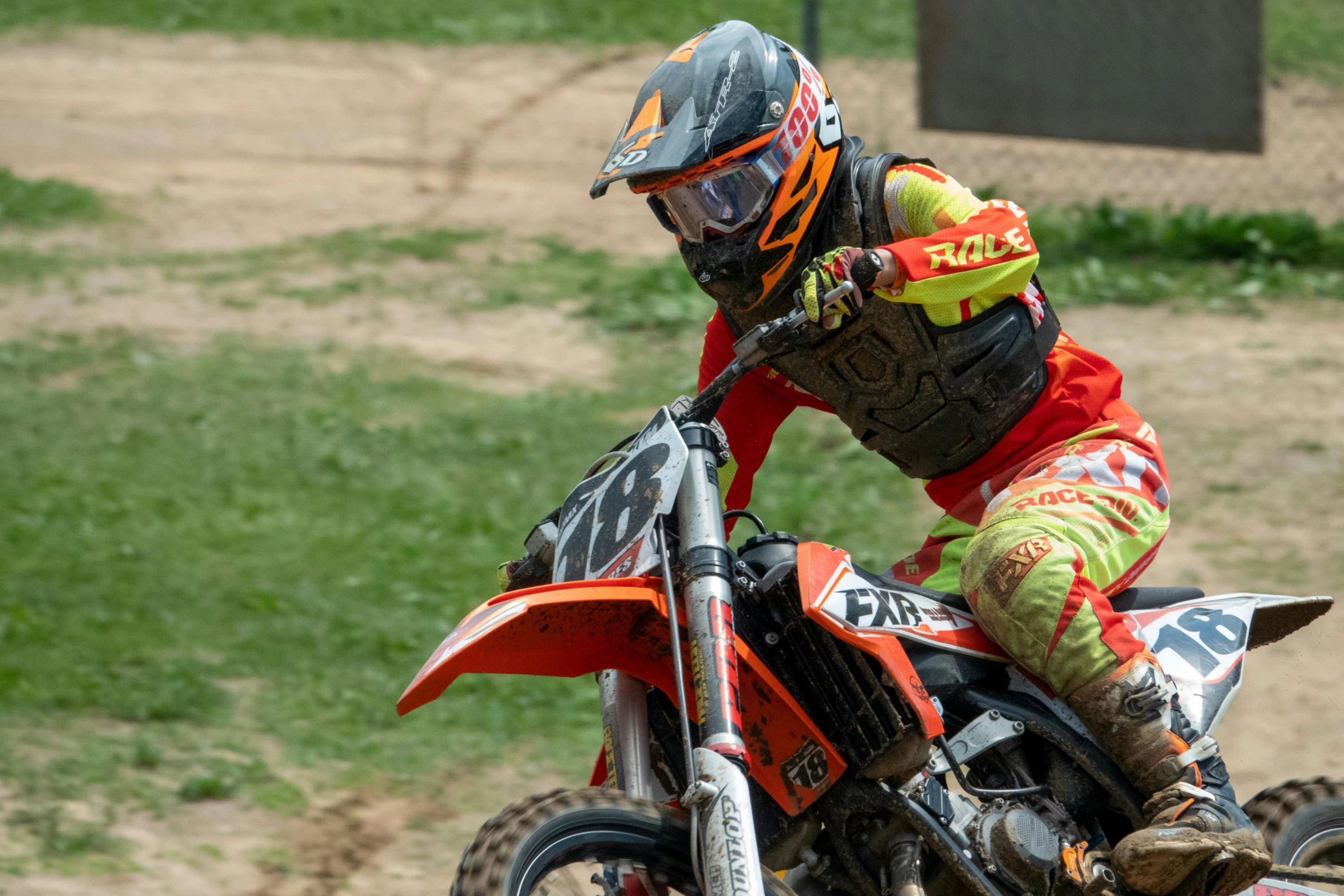 a person riding on the back of a dirt bike